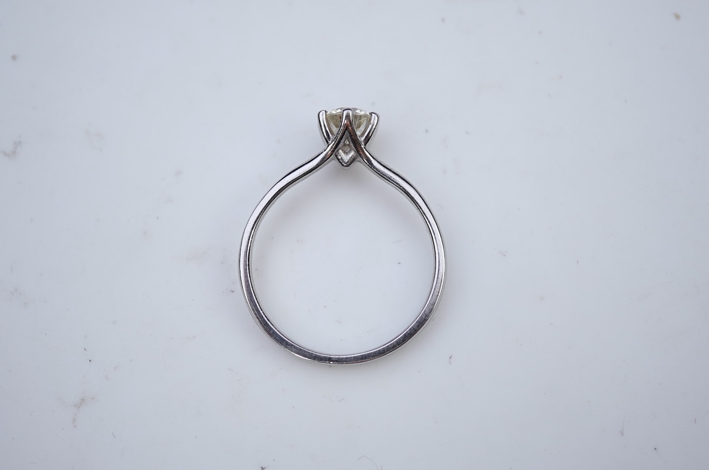 A diamond solitaire ring